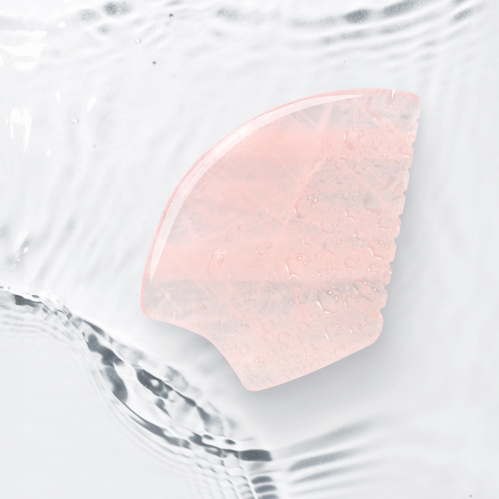Karbowany kamień Gua Sha z naturalnego różowego kwarcu